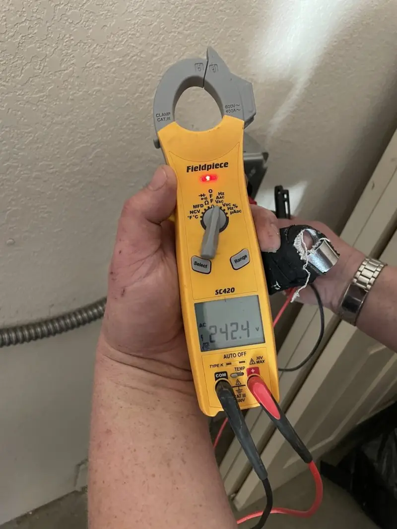 Voltage testing with clamp meter during Hot Tub / Pool Electrical Wiring in Pleasant Run Farm